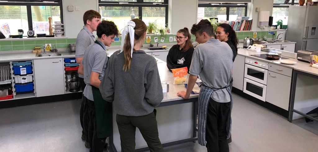 Chiltern Way students cooking in a class