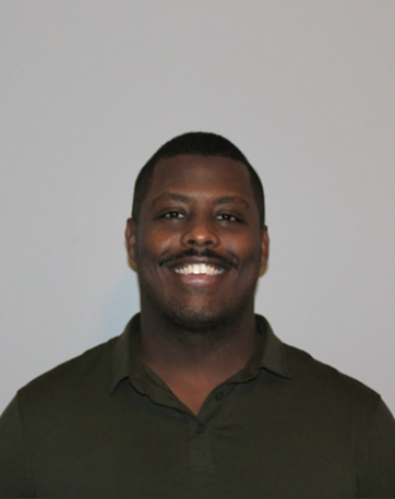 a black man wearing a black shirt with a white background