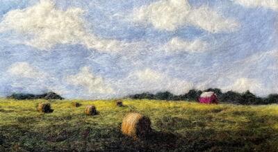 Art showing a hay field made out of felt.