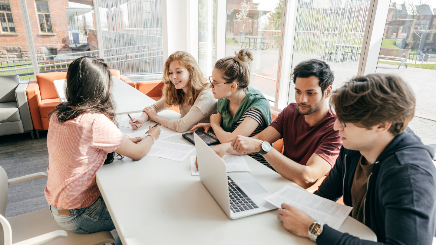 a group of students working together