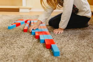 student playing with blocks