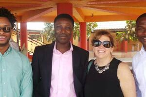 Hakeem, Jane and 2 other 1 Million Teachers staff in Abidjan