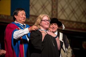 Glenda at convocation with Peter Chin