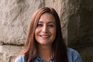 Nicole smiles at the camera