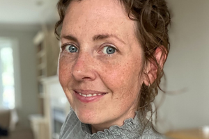 Kate smiles at the camera