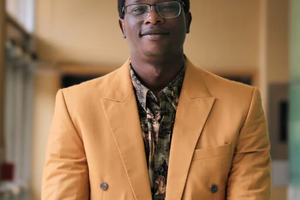 Ikeoluwapo Baruwa smiling at the camera