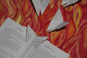 Untitled by Artemis O'Grady features a book that is open and has the pages folded with butterflies flying out of it. 