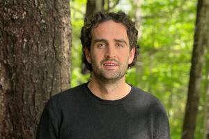 Micah Flavin in a forest 