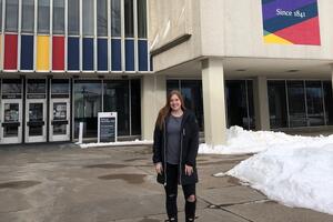 Jessi Zandbelt poses smiling outside of Duncan McArthur Hall.
