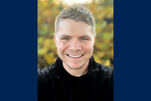 A photo of Jake DesRochers with a Queen's blue border.