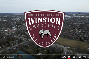 Winston Public School coat of arms over an aerial shot of the school