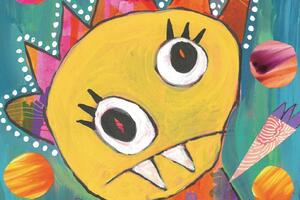 A magazine with the image of a colorful monster illustration 