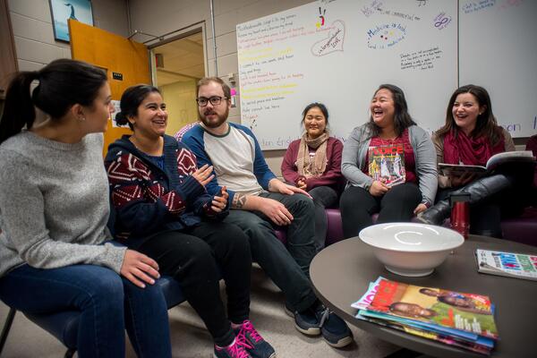 Students laughing in classroom 