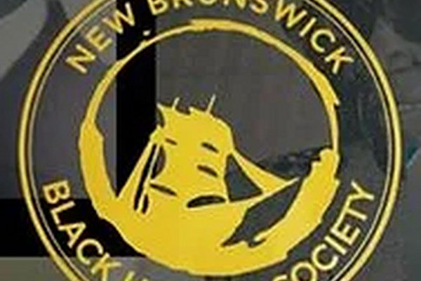 New Brumswick Black History Society logo featuring a circle with a yellow ship in the middle