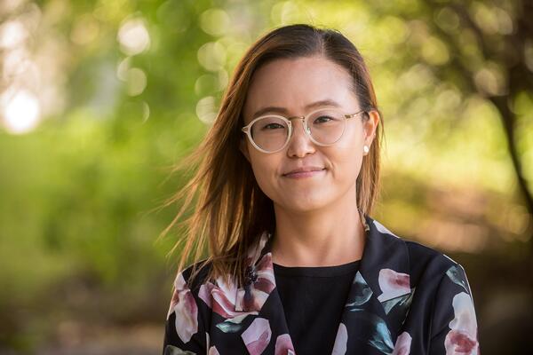 Claire Ahn smiles outside.