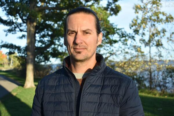 Jordan Shurr smiles outside.