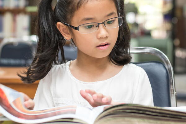 A girl reading a book 
