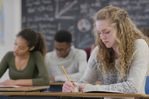 a group of students studying in a classroom