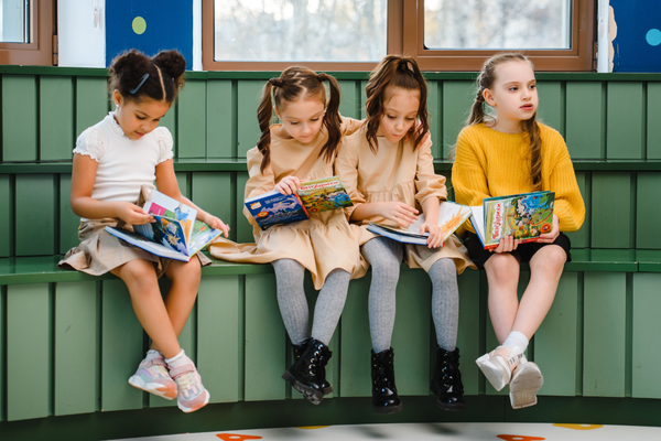 a group of children reading