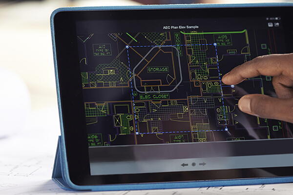 a tablet with a software showing a circuit board