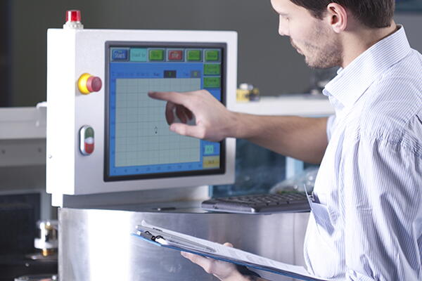 a doctor working a machine