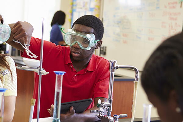 a group of students in a chemistry lab