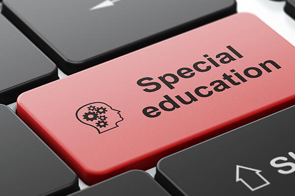 a keyboard with a key that has "special education" as the text on it