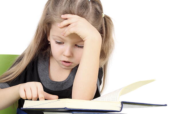 a child reading a book