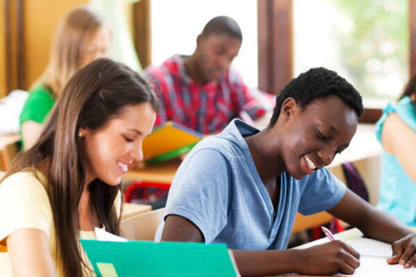 a group of students working in a classroom