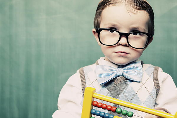 a child dressed up as a math professor