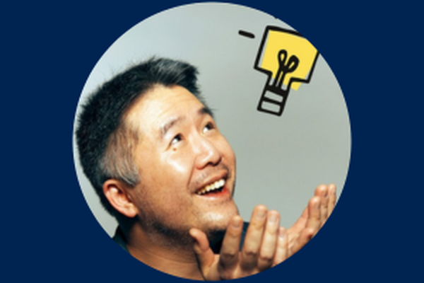 Headshot of Leo Chan with a lightbulb above his head. He looks off and to the side at the lightbulb.