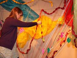 A teacher candidate preparing an installation piece.
