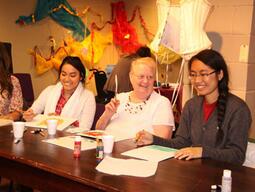 Seniors and teacher candidates doing arts activities.