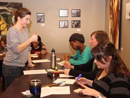 Teacher candidates doing arts activities.