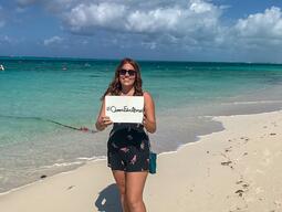 Samantha Charmley, B.Ed. alumna, at a beach in Turks and Caicos