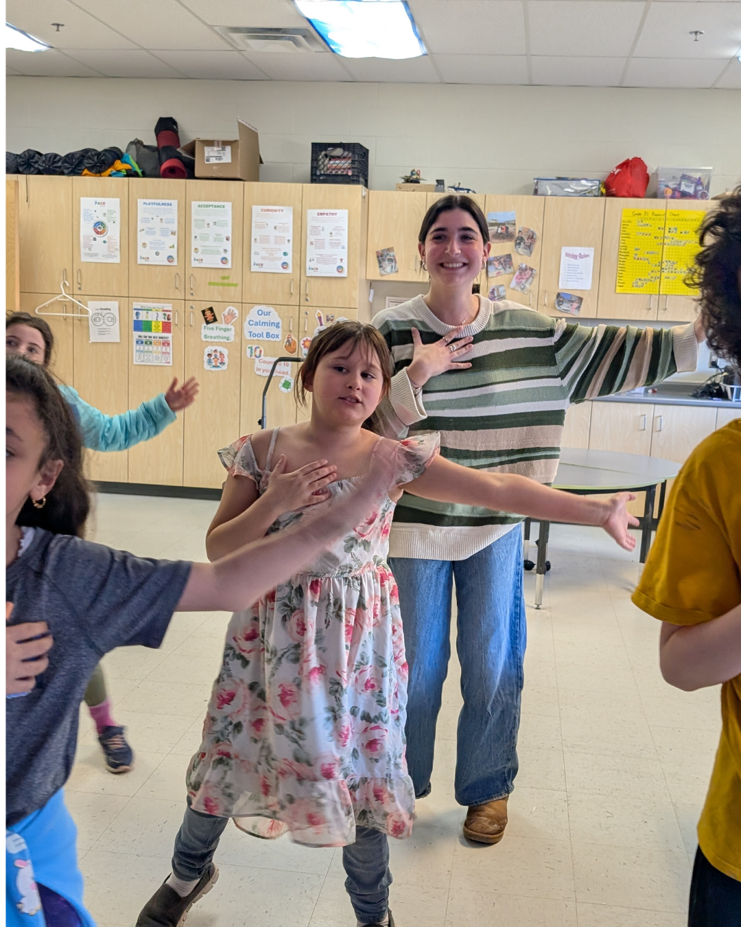 Hannah with students