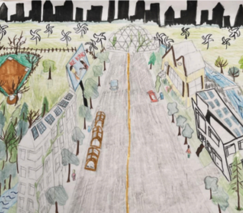 Art by Anna Himmelman, depicts a road through a town with houses on both sides of the road and a wind farm and greenhouse.