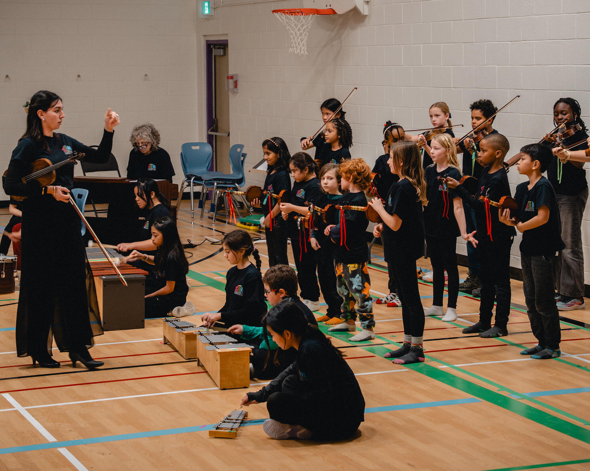 Bibi Henson working with her students