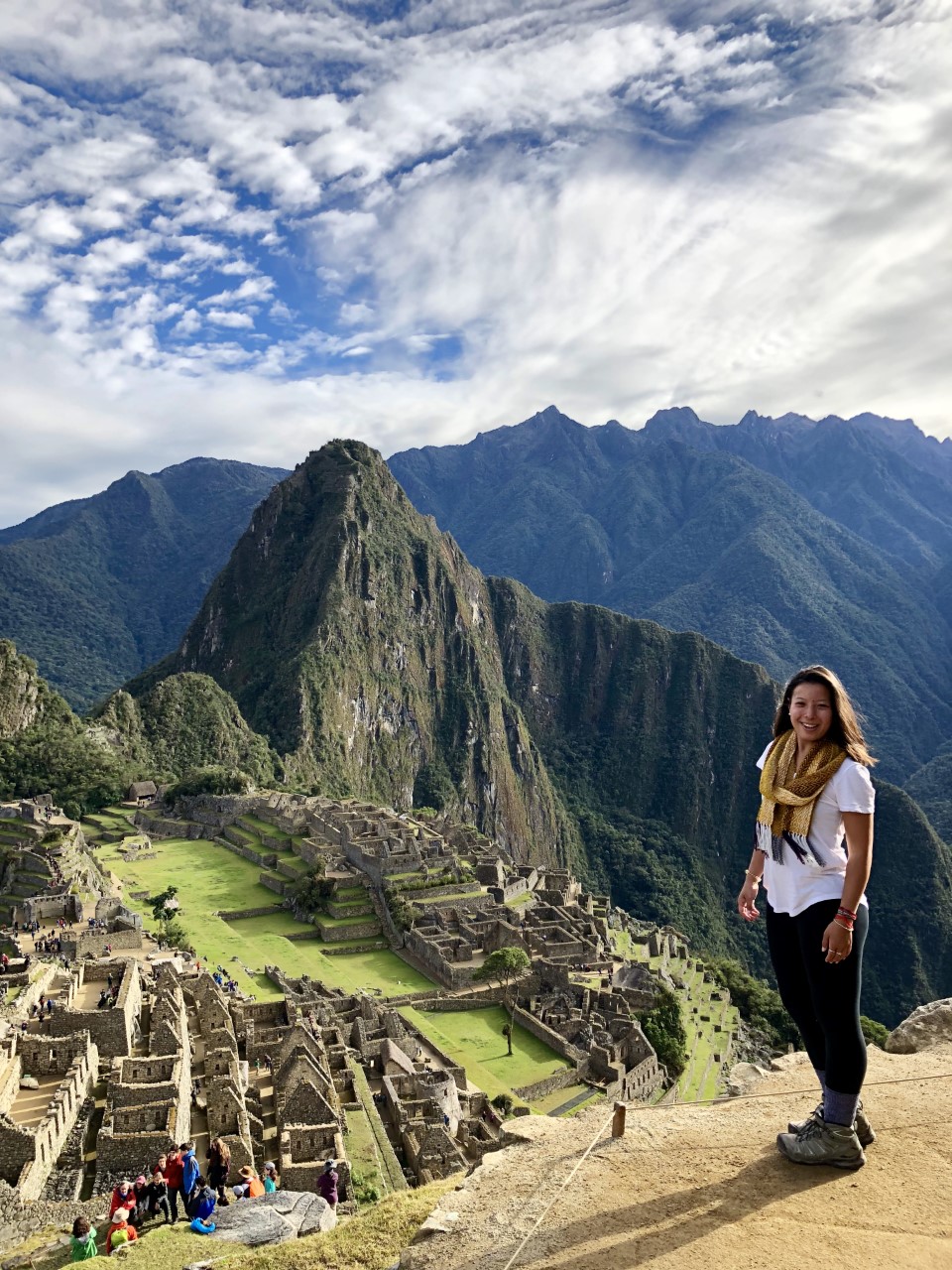 Kristin Lum-Tuong stands in front of a mountain.