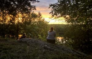 OEE Teacher Candidates enjoying the sunset during their field camp