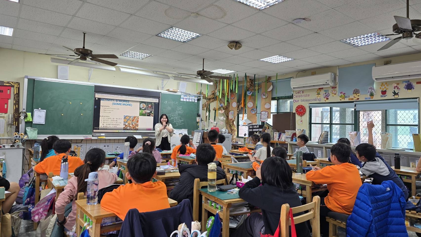 Jo Chen in a busy classroom 