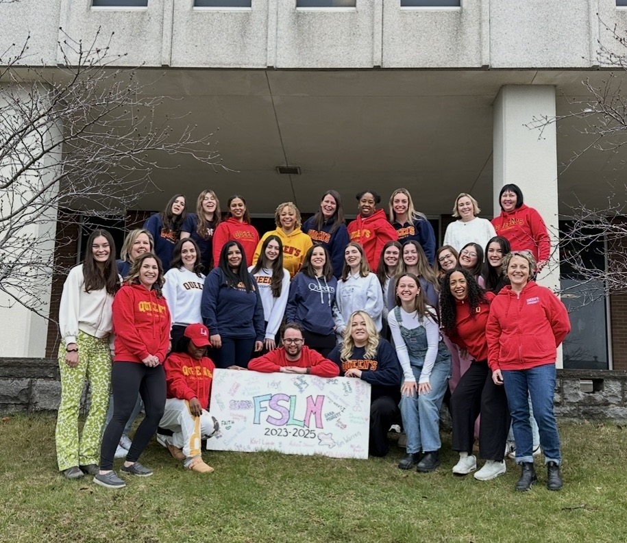The FSLM Class of 2025 posing in front of Duncan McArthur Hall 